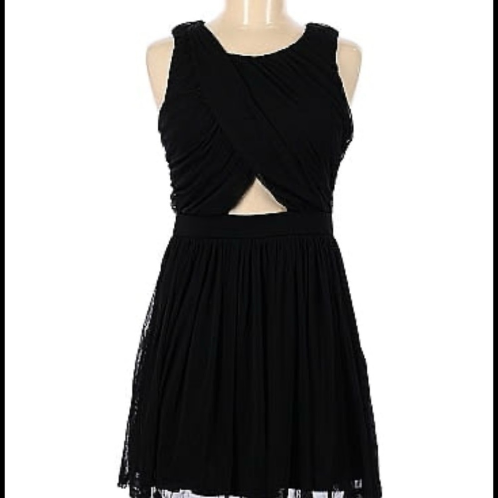 Black cats cocktail dress. Brand : Forever 21